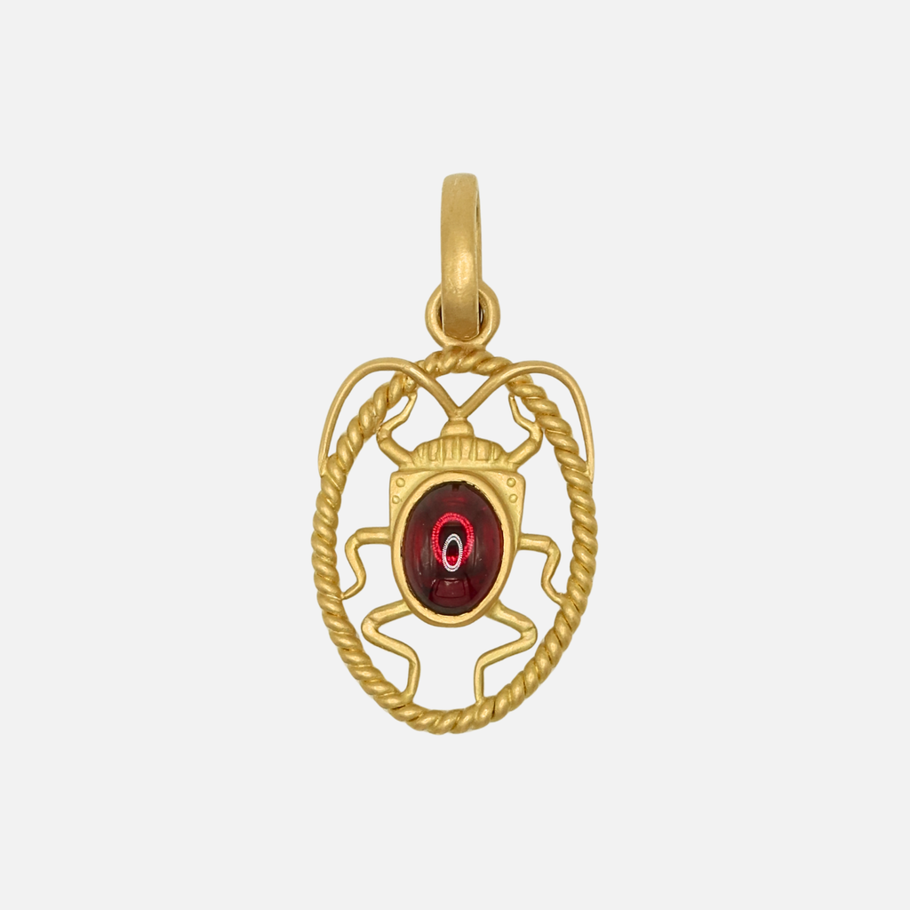 Entomo Jewel Bug Tag with an Oval Cabochon Garnet in 20K Peach Gold