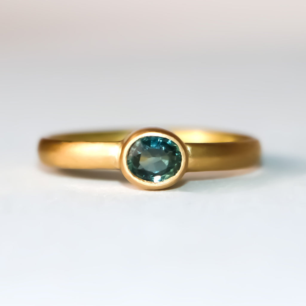 Sonoma Mini Oval Teal Sapphire Ring in 20K Peach Gold Reinstein Ross Goldsmiths