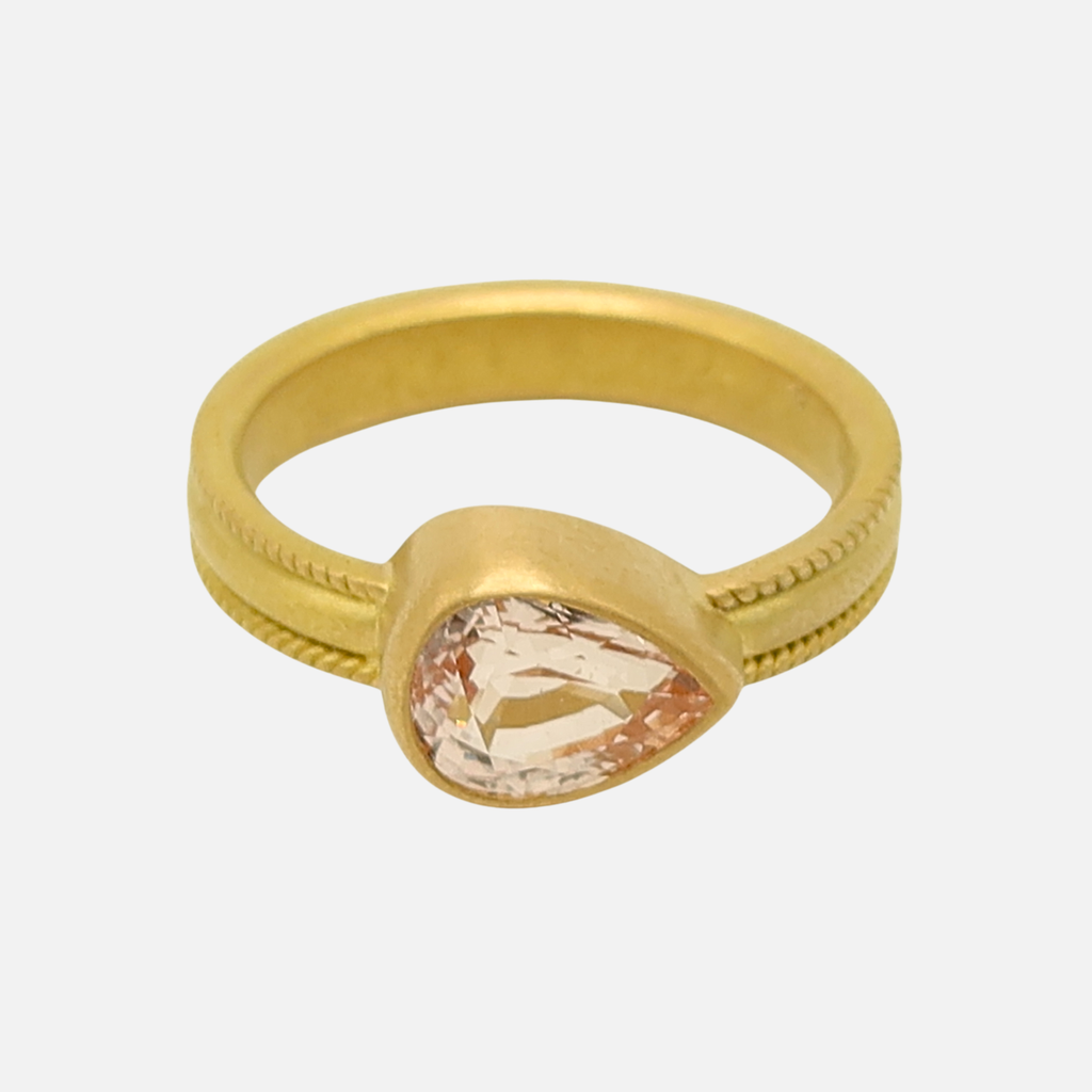 Ribbon Pear Shape Pink Sapphire Ring in 20K Peach Gold