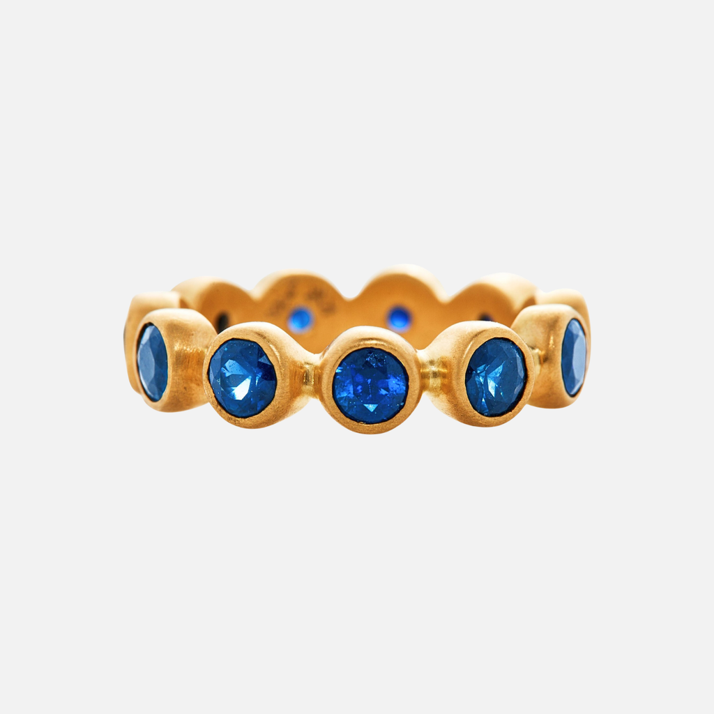 Renaissance Faceted Round Blue Sapphire Band in 20K Peach Gold
