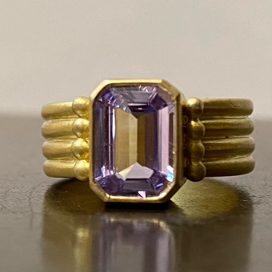 Half Round "Penta" Four Row Emerald Cut Lilac Sapphire Ring in 20K Peach Gold Reinstein Ross Goldsmiths