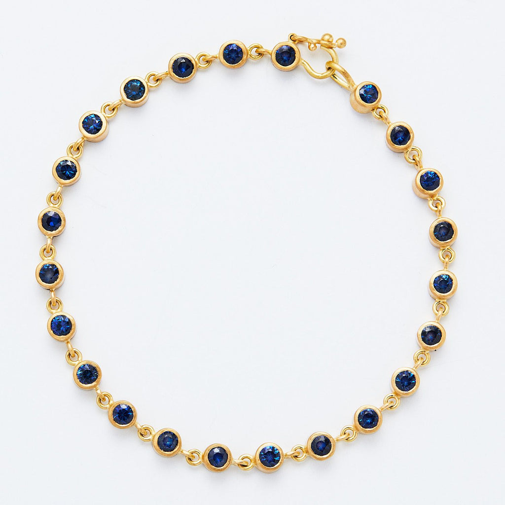 Meadow Rivière Blue Sapphire Bracelet in 20K Peach Gold Reinstein Ross Goldsmiths