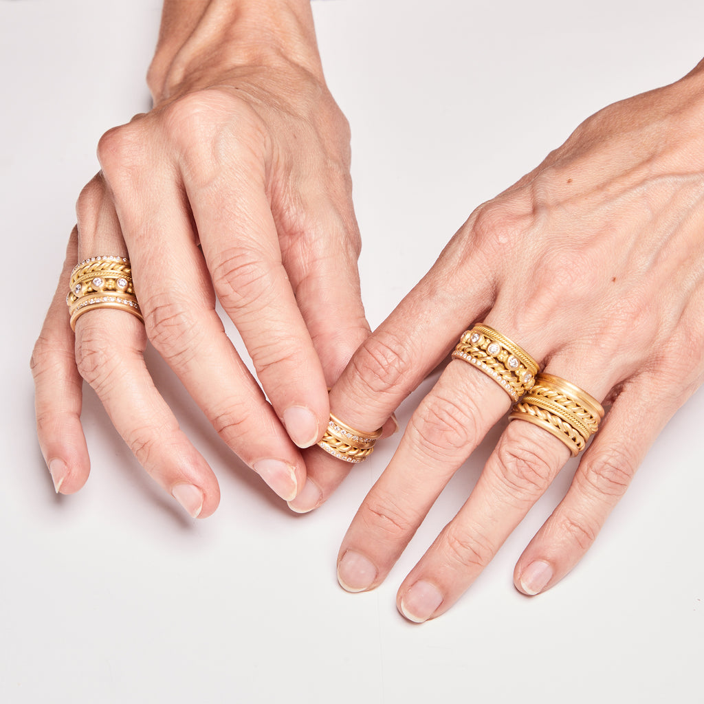 Hitched Trio Diamond Band set in 20K Peach Gold