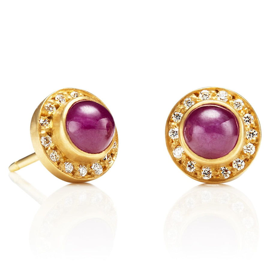 Premium AI Image | Isolated of Stud Earrings Gold Round Cabochon Ruby Studs  Bright Red Ruby Design Creative Concept
